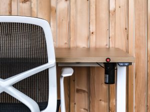 a close up of a desk and a chair
